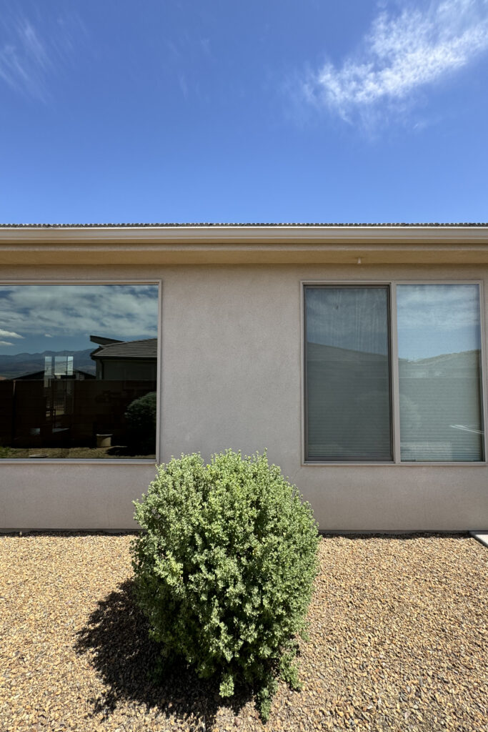 Windows on house that are tinted.